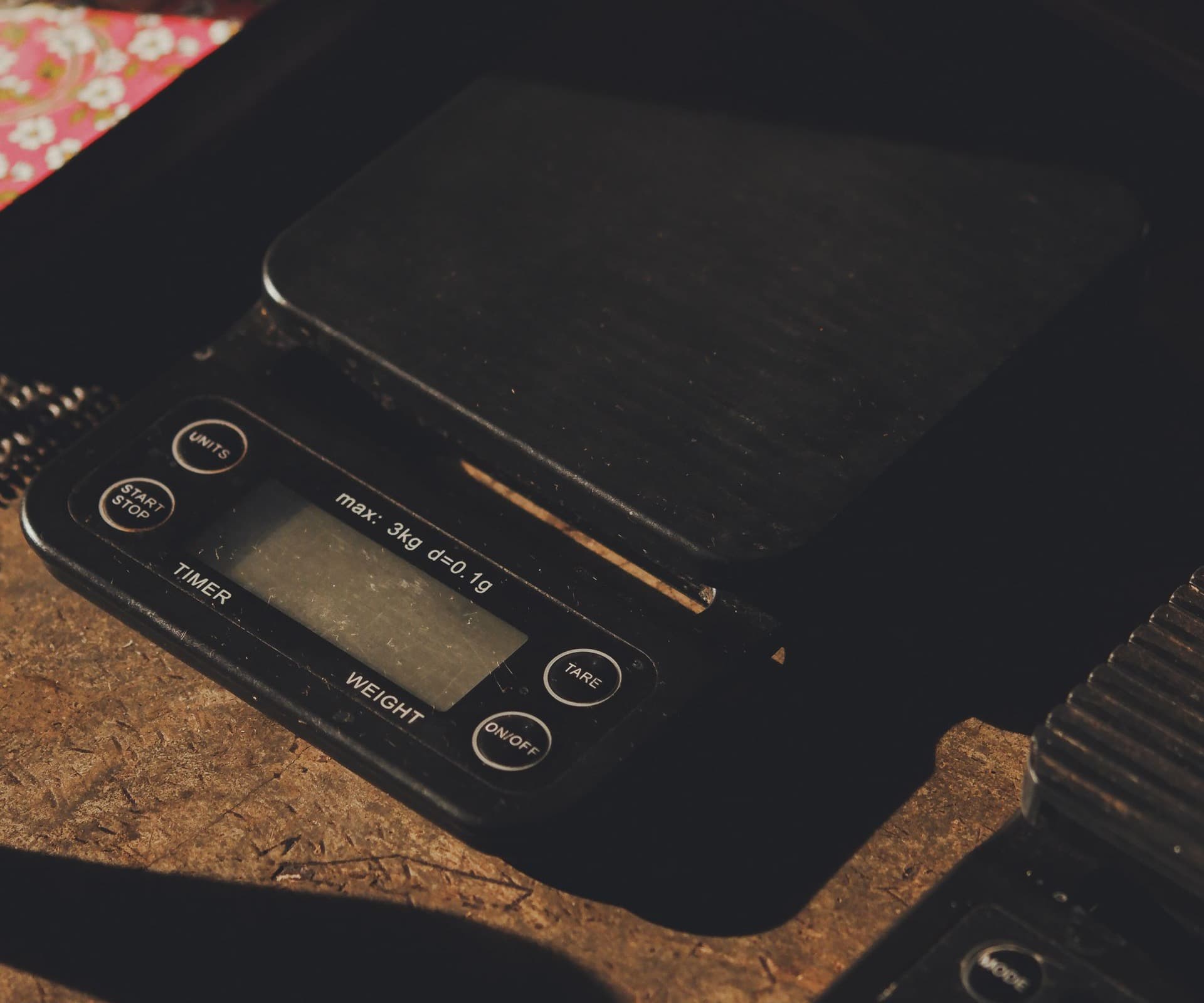 Digital kitchen scale on a wooden table